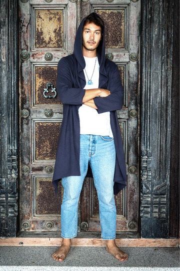 navy blue mid-length cotton cardigan with hood and asymmetrical hem, over jeans and white shirt